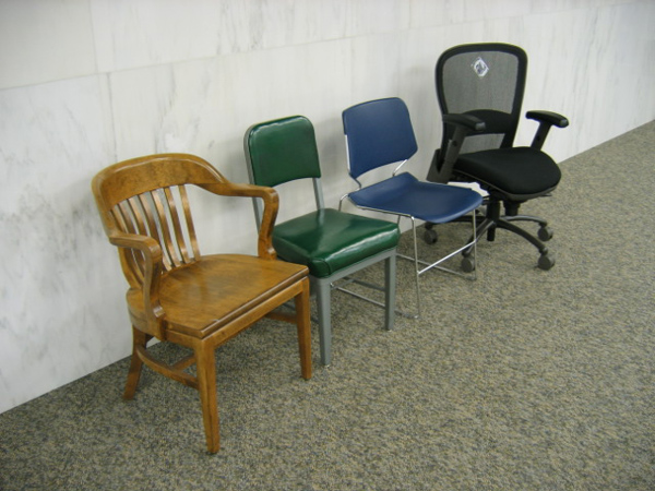 four chairs from different eras